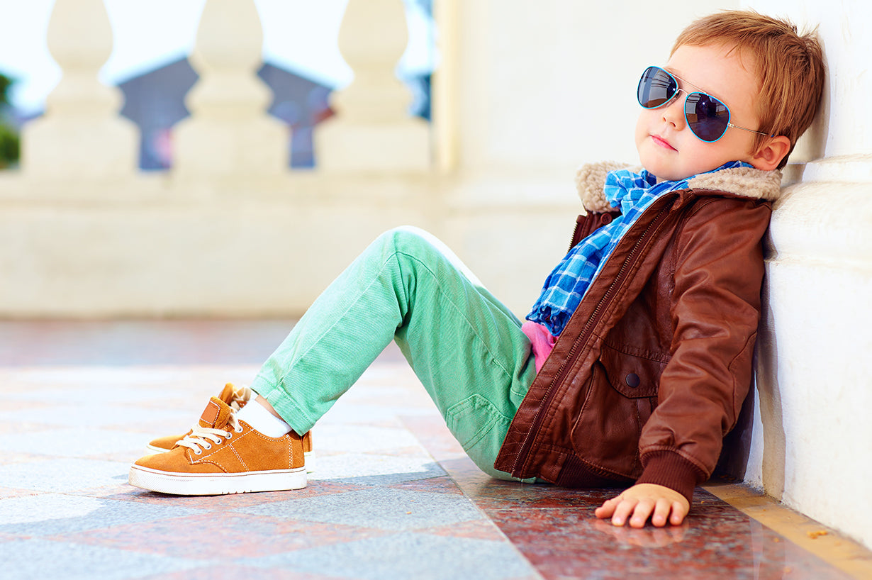 A little boy posing for model